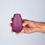 Juguete Conic Lila en la mano (tamaño mediano)